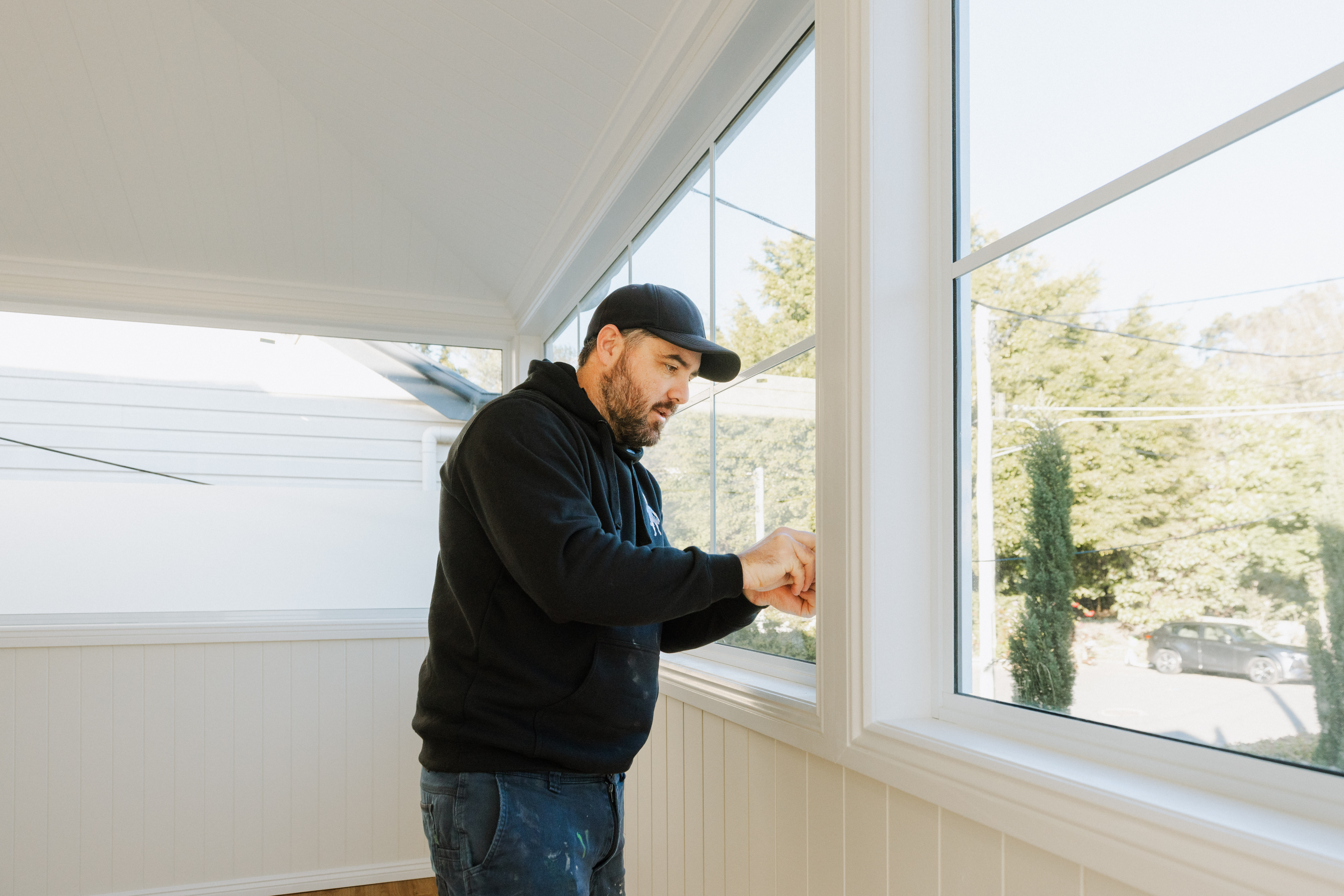 Tomas Farr completing window installation on home extension in South Brisbane
