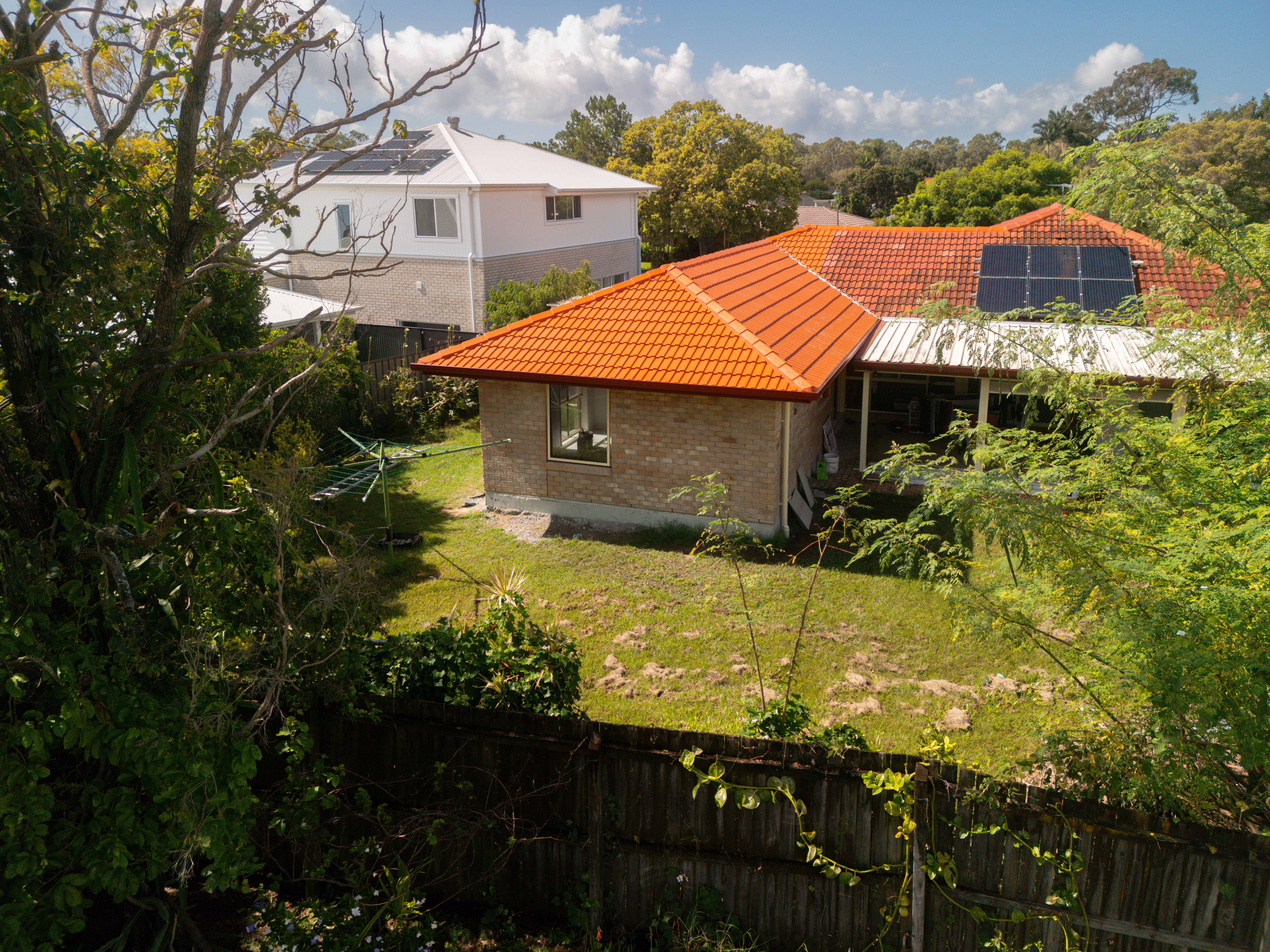 Rear aerial view of Alexandra Hills property showing house extension footprint