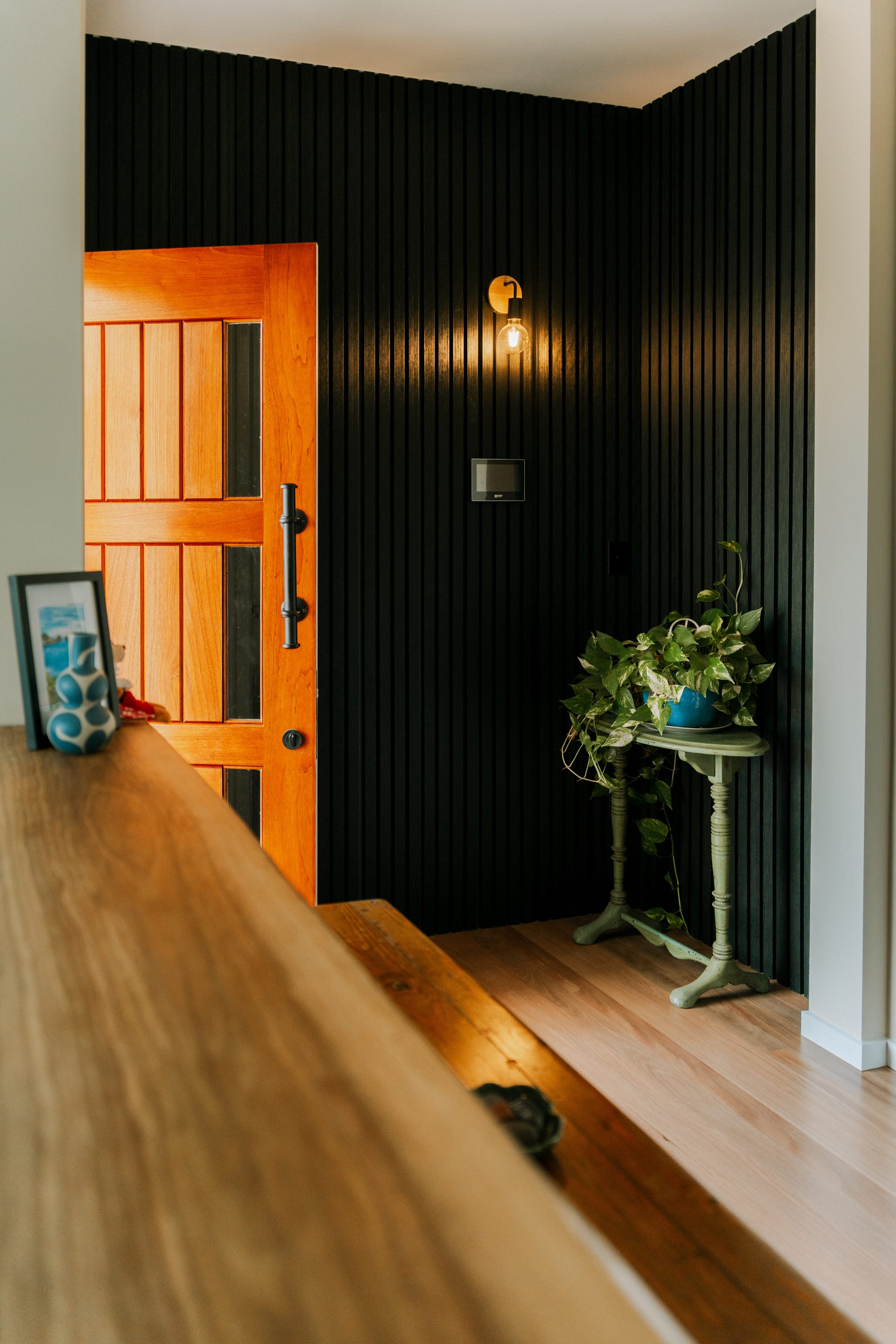 Feature timber entry door inside modern home